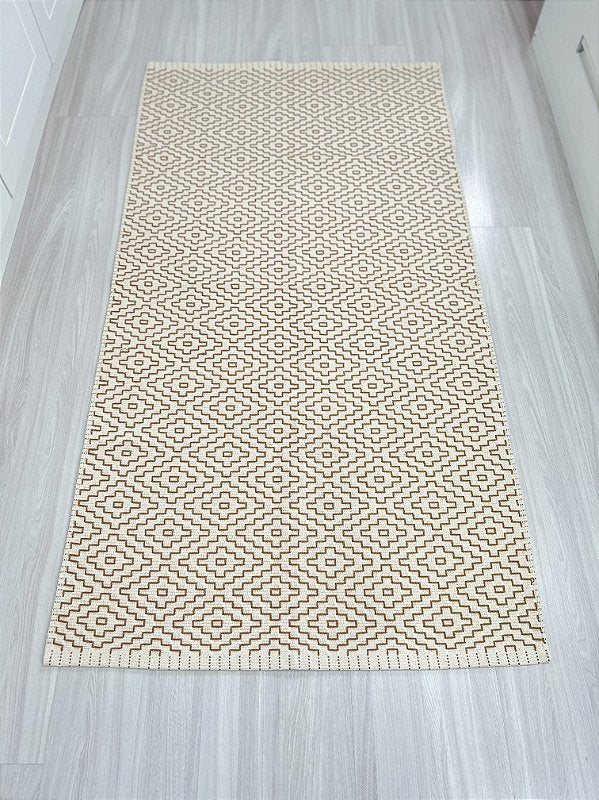 Tapete bordado G caramelo 75 x 140 cm