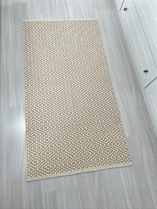 Tapete bordado G caramelo 75 x 140 cm