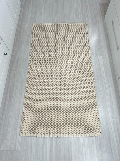 Tapete bordado G caramelo 75 x 140 cm